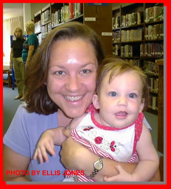 PHOTO TAKEN MAY 3, 2002

AT THIS TIME ELIZABETH IS 10 MONTH OLD,
SHE MAY HAVE A LIBRARY CARD, AND SHE LOVES A COMPUTER